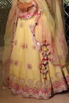 Shop_XOXO Apurva_Yellow Satin Organza Embroidered Floral Boat Carnival Lehenga Set  _Online_at_Aza_Fashions