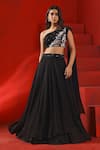 Isha Gupta Tayal_Black Crepe Embroidery Floral Asymmetric Neck Layered Lehenga And Blouse Set _Online_at_Aza_Fashions