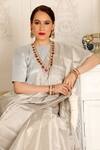 Sheela Suthar_Silver Handwoven Zari Tissue Plain Sava Saree With Running Blouse _at_Aza_Fashions