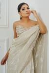 AMRTA_Off White Shell Beaded Pre-draped Saree With Blouse_at_Aza_Fashions