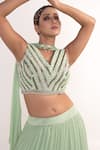 Shop_Merge Design_Green Chiffon, Crepe Sequins, Piping V-neck Tiered Lehenga Set _Online_at_Aza_Fashions