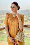 Sheela Suthar_Gold Handwoven Zari Tissue Plain Arka Saree With Running Blouse _at_Aza_Fashions