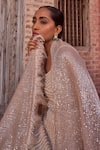 Nidhika Shekhar_Beige Silk Embroidery Sequins Cape Open Feather Lehenga Set_at_Aza_Fashions