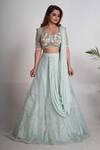 Merge Design_Blue Net, Organza, Chiffon Embroidery, Pearls, Sequins Sweetheart Lehenga Set _at_Aza_Fashions