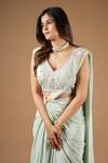 Shop_Vana Ethnics_Green Viscose Sequins, Embroidery V-neck Pre-draped Saree With Blouse _at_Aza_Fashions