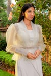 Shop_OMANA BY RANJANA BOTHRA_Ivory Linen Satin Plain Jacket Lapel Collar Mia Peplum Skirt Set _Online_at_Aza_Fashions