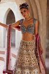 Shop_Kaaisha by Shalini_Ivory Silk Embellished Zardozi Sweetheart Neck Bridal Lehenga Set _at_Aza_Fashions