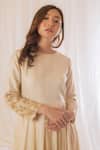 Vaani Beswal_Beige Handwoven Tussar Silk Floral, Thread Round Sleeve Embroidered Dress _at_Aza_Fashions