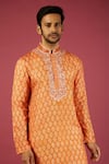 Krishna Mehta_Orange Tussar Printed Floral Flower Block Kurta Set _Online_at_Aza_Fashions