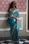 Kasturi Kundal_Blue Pure Silk Floral And Geometric Motifs Chaand Ki Jaali Woven Saree  _at_Aza_Fashions