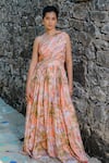 Redpine Designs_Peach Viscose Crepe Print Water Splash Floral Asymmetric Neck Jumpsuit _Online_at_Aza_Fashions