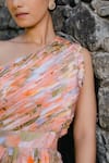 Buy_Redpine Designs_Peach Viscose Crepe Print Water Splash Floral Asymmetric Neck Jumpsuit _Online_at_Aza_Fashions