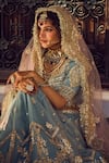 LASHKARAA_Blue Net Embroidery Zari V Neck Floral Bouquet Bridal Lehenga Set_Online_at_Aza_Fashions