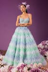 Mala and Kinnary_Blue Net Embellishment Sequin Sweetheart Neck Ombre Tiered Lehenga And Corset Set _Online_at_Aza_Fashions