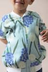 Thetaa Blue Cotton, Polyester, Satin Embroidery Tulip Print Bomber Jacket at Aza Fashions Thetaa_Blue Cotton, Polyester, Satin Embroidery Tulip Print Bomber Jacket _at_Aza_Fashions