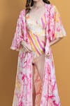 Shop_Mandira Wirk Resort_Pink Spandex And Chiffon Orchid & Daisy Print V Cutout Bodysuit With Long Cape _at_Aza_Fashions