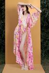 Shop_Mandira Wirk Resort_Pink Spandex And Chiffon Orchid & Daisy Print V Cutout Bodysuit With Long Cape _Online_at_Aza_Fashions