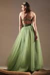 Nikita Mhaisalkar_Green Tulle Solid Flared Lehenga _Online