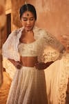 Buy_Ridhi Mehra_Ivory Net Mir Floral Embroidered Lehenga Set_Online_at_Aza_Fashions