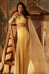 Shop_Ridhi Mehra_Yellow Net Amal Floral Embroidered Lehenga Saree And Blouse Set_Online_at_Aza_Fashions