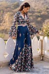 Suruchi Parakh_Blue Georgette Crepe Printed Floral Shawl Collar Jumpsuit With Belt _Online_at_Aza_Fashions