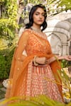 Buy_Suruchi Parakh_Orange Raw Silk Embroidered Floral V Neck Bridal Lehenga Set _Online_at_Aza_Fashions