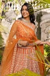 Shop_Suruchi Parakh_Orange Raw Silk Embroidered Floral V Neck Bridal Lehenga Set _Online_at_Aza_Fashions