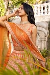 Suruchi Parakh_Orange Raw Silk Embroidered Floral V Neck Bridal Lehenga Set _at_Aza_Fashions