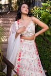 Shop_Suruchi Parakh_White Georgette Crepe Printed Floral V Neck Tiered Lehenga Set _Online_at_Aza_Fashions