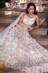 Suruchi Parakh_White Georgette Crepe Printed Floral V Neck Tiered Lehenga Set _at_Aza_Fashions