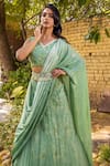 Buy_Suruchi Parakh_Green Georgette Printed And Hand Embellished Floral Lehenga Saree & Blouse Set _Online_at_Aza_Fashions