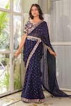 Suruchi Parakh_Blue Georgette Crepe Printed Sequin V Neck Embroidered Saree With Blouse _Online_at_Aza_Fashions