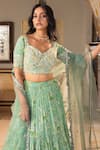 Shop_suruchi parakh_Green Georgette Woven And Embroidered Floral Pattern Sweetheart Tiered Lehenga Set_Online_at_Aza_Fashions