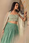 suruchi parakh_Green Georgette Crepe Hand Embroidered And Woven Bead Sequin Lehenga Blouse Set_at_Aza_Fashions