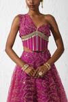 Rishi and Vibhuti_Pink Net, Organza Stones One Shoulder Rosella Corset And Skirt Set_Online_at_Aza_Fashions