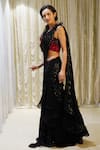 Archana Kochhar_Black Georgette Embroidered Sequins Cosmic Pre-stitched Skirt Saree With Blouse _Online_at_Aza_Fashions