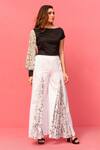 Shristi Chetani_White Cotton Abstract Print Flared Pant_Online_at_Aza_Fashions