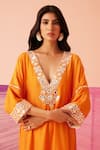 Sureena Chowdhri_Orange Muslin Embroidered Mirror And Resham Work Oblivion Yoke Kaftan  _at_Aza_Fashions