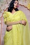 Shilpi Gupta_Yellow Organza Beads V-neck Border Embroidered Saree With Floral Detail Blouse _Online_at_Aza_Fashions