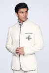 S&N by Shantnu Nikhil_Off White Suiting Fabric Embroidered Patch Logo Bandhgala _Online_at_Aza_Fashions