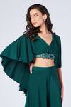 Shop_S&N by Shantnu Nikhil_Emerald Green Poly Jersey Embellished Faux Leather V Neck Draped Sleeve Crop Top _Online_at_Aza_Fashions