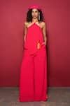 Style Junkiie_Fuchsia Moss Crepe Plain Halter Neck Flared Jumpsuit  _Online_at_Aza_Fashions