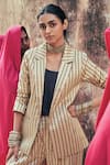 Taisha_Brown Pure Katan Silk Handwoven Fekua Geometric Pattern Blazer Notched Pant Set _at_Aza_Fashions