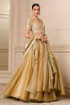 Tarun Tahiliani_Gold Shot Organza Embroidered Floral Sweetheart Blouse Draped Bridal Skirt Set _Online_at_Aza_Fashions