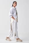 Shop_THREE_White Tencel Embroidered Fringes Detailed Cargo Pant _at_Aza_Fashions