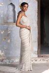 Buy_Nitika Gujral_Beige Net, Georgette Sequins, Crystals, Embroidered Saree With Sleeveless Blouse _Online_at_Aza_Fashions