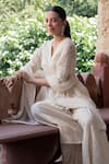 PREEVIN_Off White Peplum Top: Cotton Flower Pattern Angrakha Sharara Set For Women_Online_at_Aza_Fashions