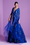 PARUL GANDHI_Blue Mesh With Silk Underlining Embroidered Crystal Moonlight Cape Sleeve Gown _at_Aza_Fashions