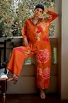 Paulmi and Harsh_Orange Crepe Printed Floral Patterns Collared Blissful Shirt And Pant Co-ord Set _Online_at_Aza_Fashions