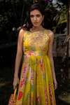 Paulmi and Harsh_Yellow Crepe Printed Floral Pattern Round Refreshing Jumpsuit _at_Aza_Fashions